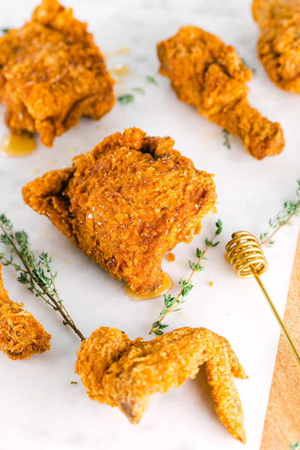 Honey drizzle fried chicken recipe styled food photography by Chelsea Loren in San Diego Southern California food photographer