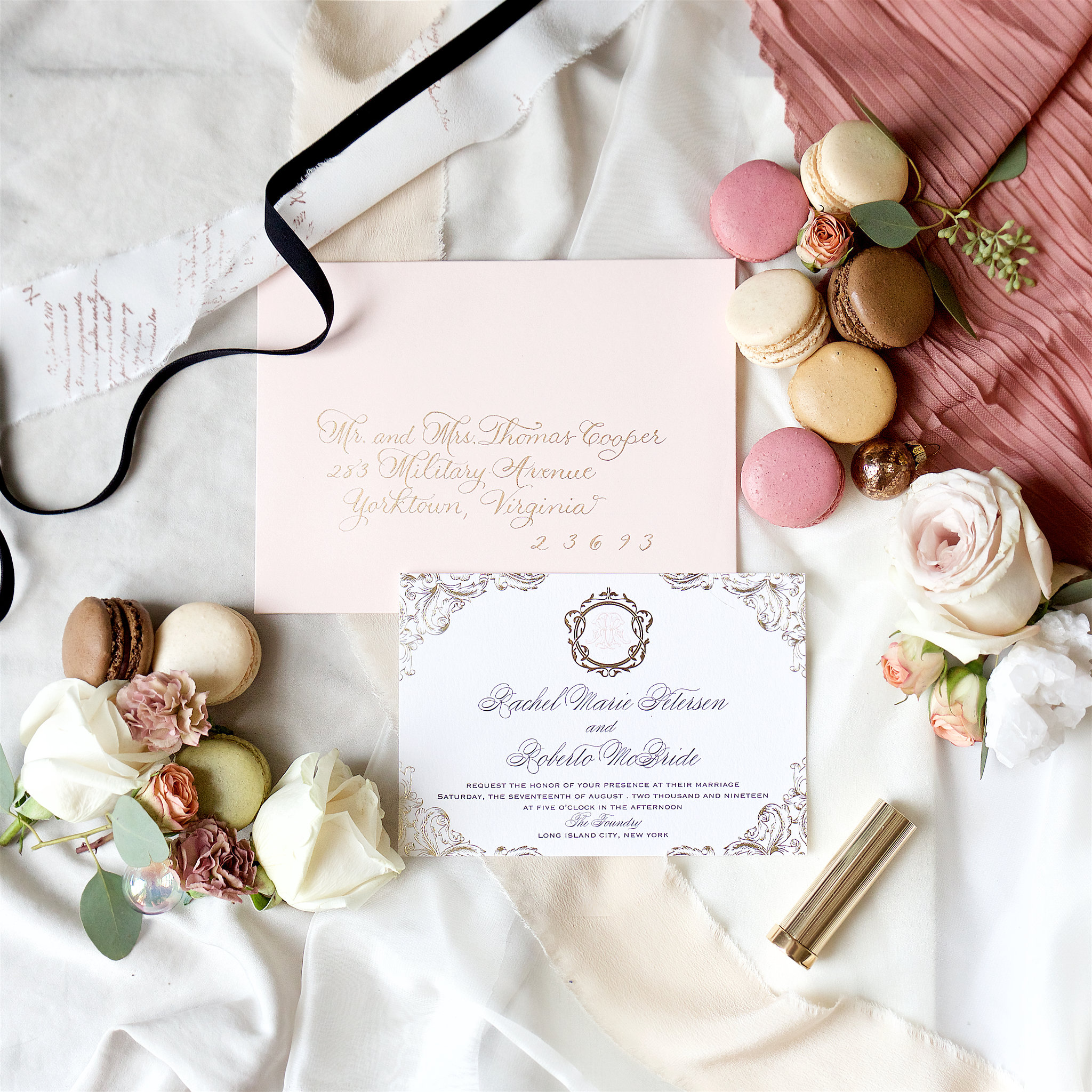 Feminine vintage French flat lay invitation suite with macarons Anthropologie Free People Etsy designer. Branding product photographer Chelsea Loren styling floral macaron flat lays.
