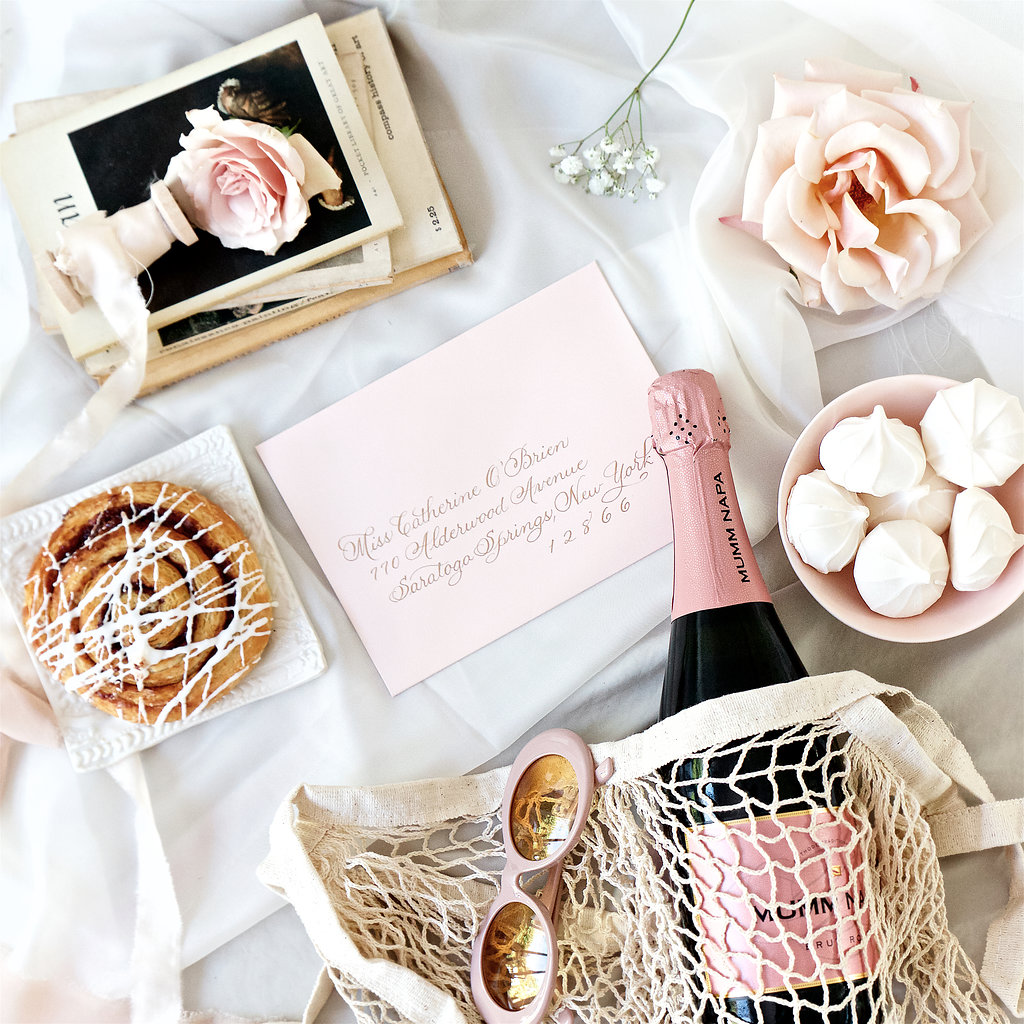 Feminine vintage French flat lay invitation suite with macarons Anthropologie Free People Etsy designer. Branding product photographer Chelsea Loren styling flat lays.