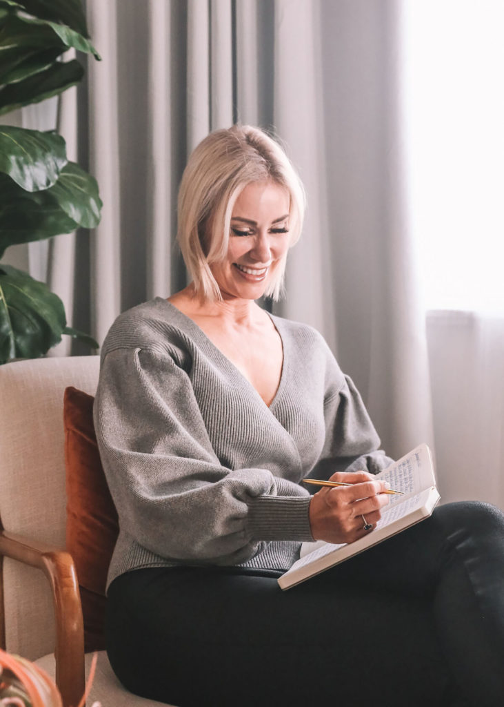 Blonde woman journaling goals small business owner branding photography