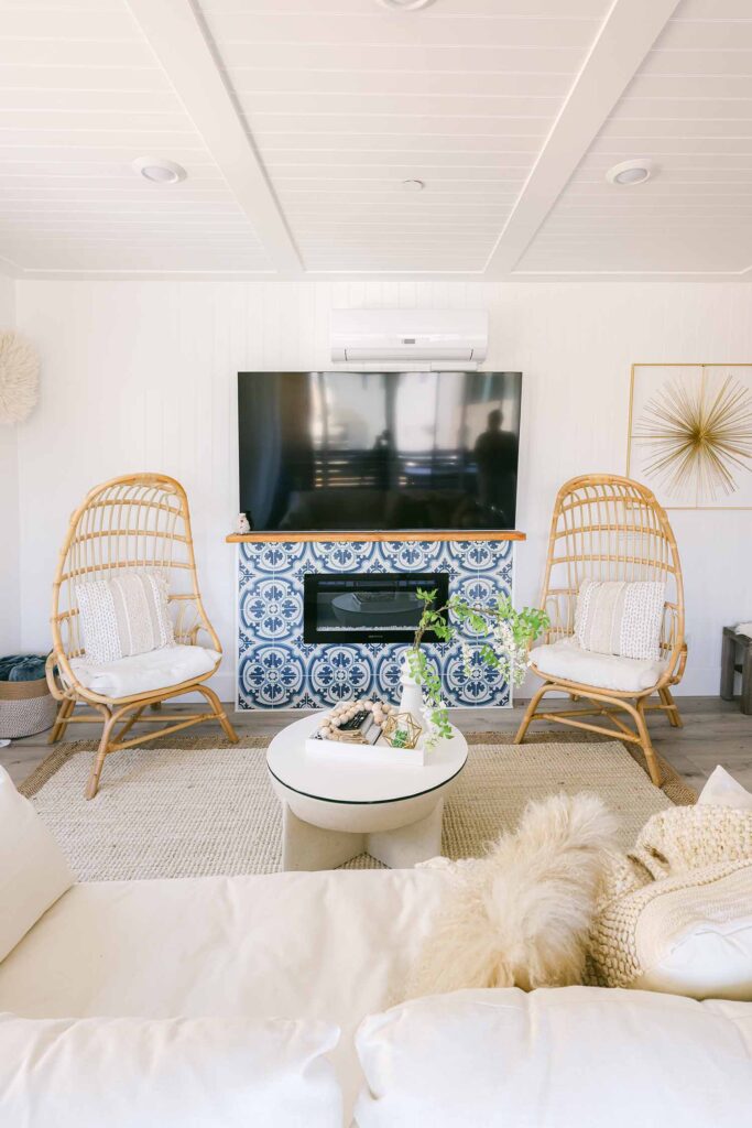 Boho rattan peacock cocoon chairs in airbnb living room southern california photographer