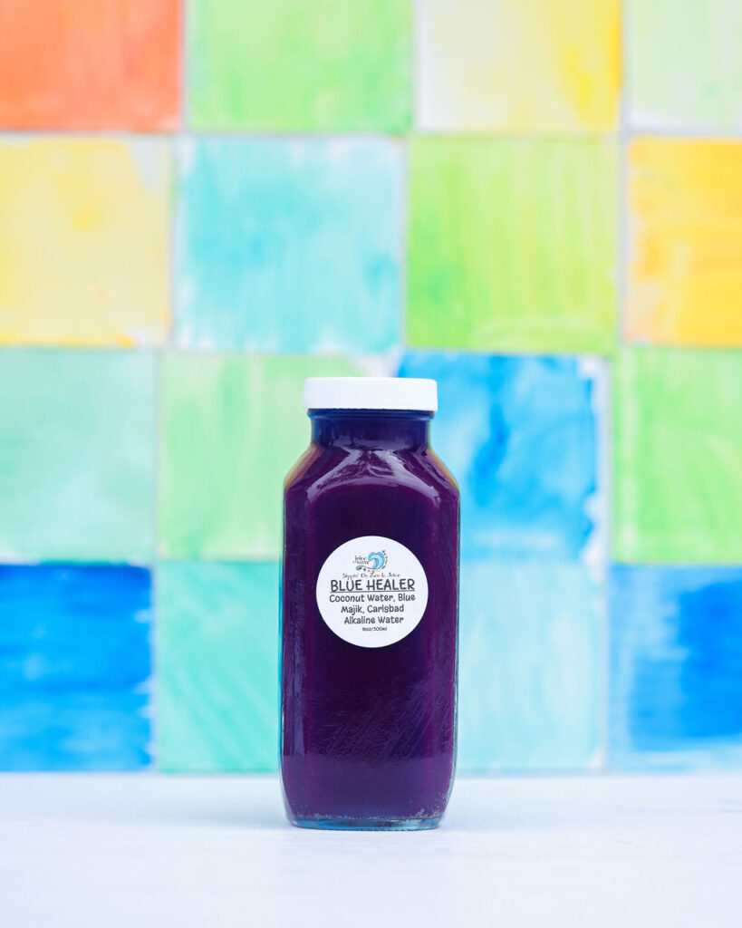 Colorful watercolor zellige tile backdrop product photography for smoothie juice brand in San Diego