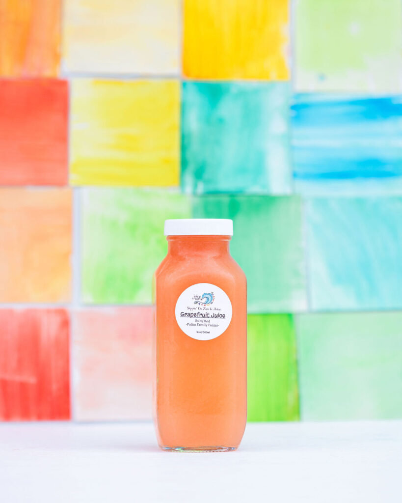 Colorful watercolor zellige tile backdrop product photography for smoothie juice brand in San Diego