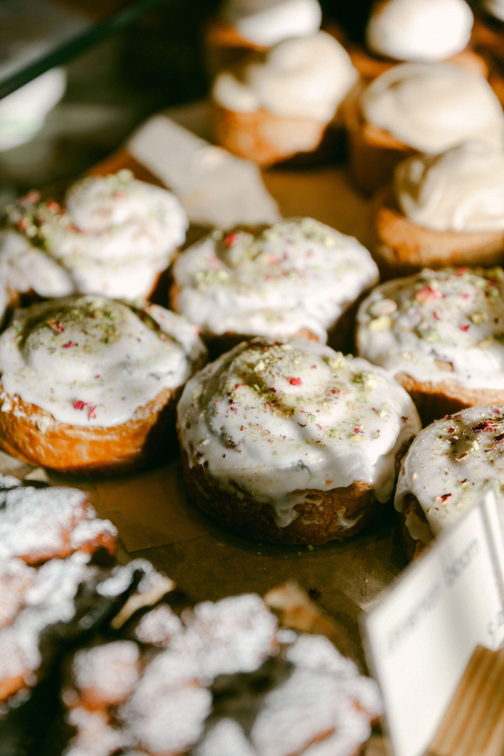 cinnamon rolls in light at alta bakery in monterey