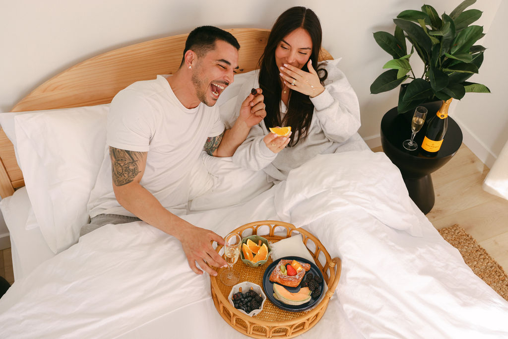 Couple making morning coffee in the modern kitchen of a luxury Carlsbad Airbnb, lifestyle photography capturing the elevated everyday experience by Chelsea Loren