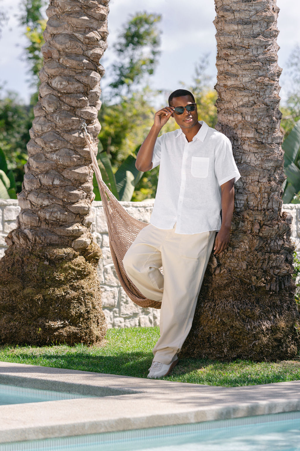 MUJI SS26 men’s hemp and linen collection – male model in structured white hemp linen shirt, fashion photography by Chelsea Loren Carlsbad California