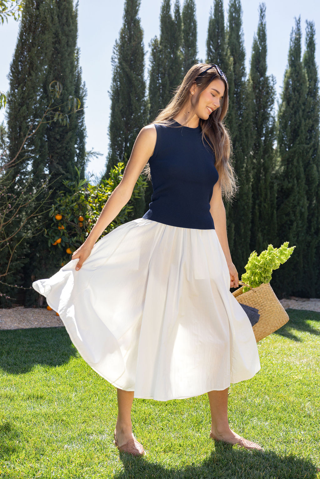 MUJI Spring Summer 2026 men's hemp collection – male model in relaxed seated pose highlighting natural linen drape, commercial brand photography by Chelsea Loren Southern California