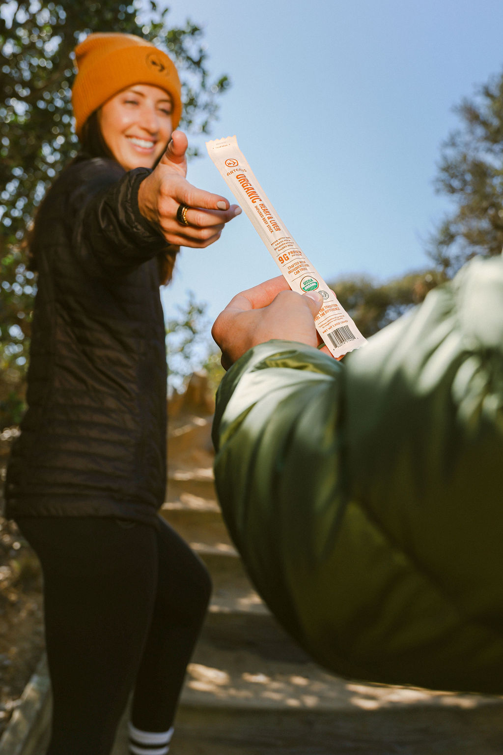 woman hiking at Torrey Pines during outdoor lifestyle photography session for CPG food brand