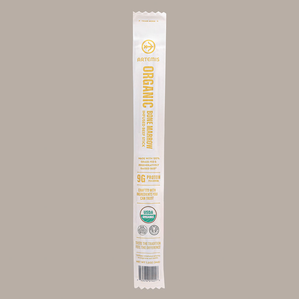 model holding branded shipping box for CPG subscription unboxing photography session