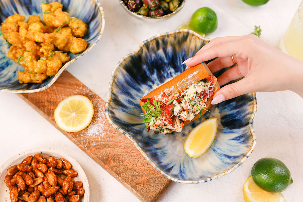 Styled shrimp tempura with curry mayo on artisan blue plate for hotel restaurant menu photography in Chula Vista