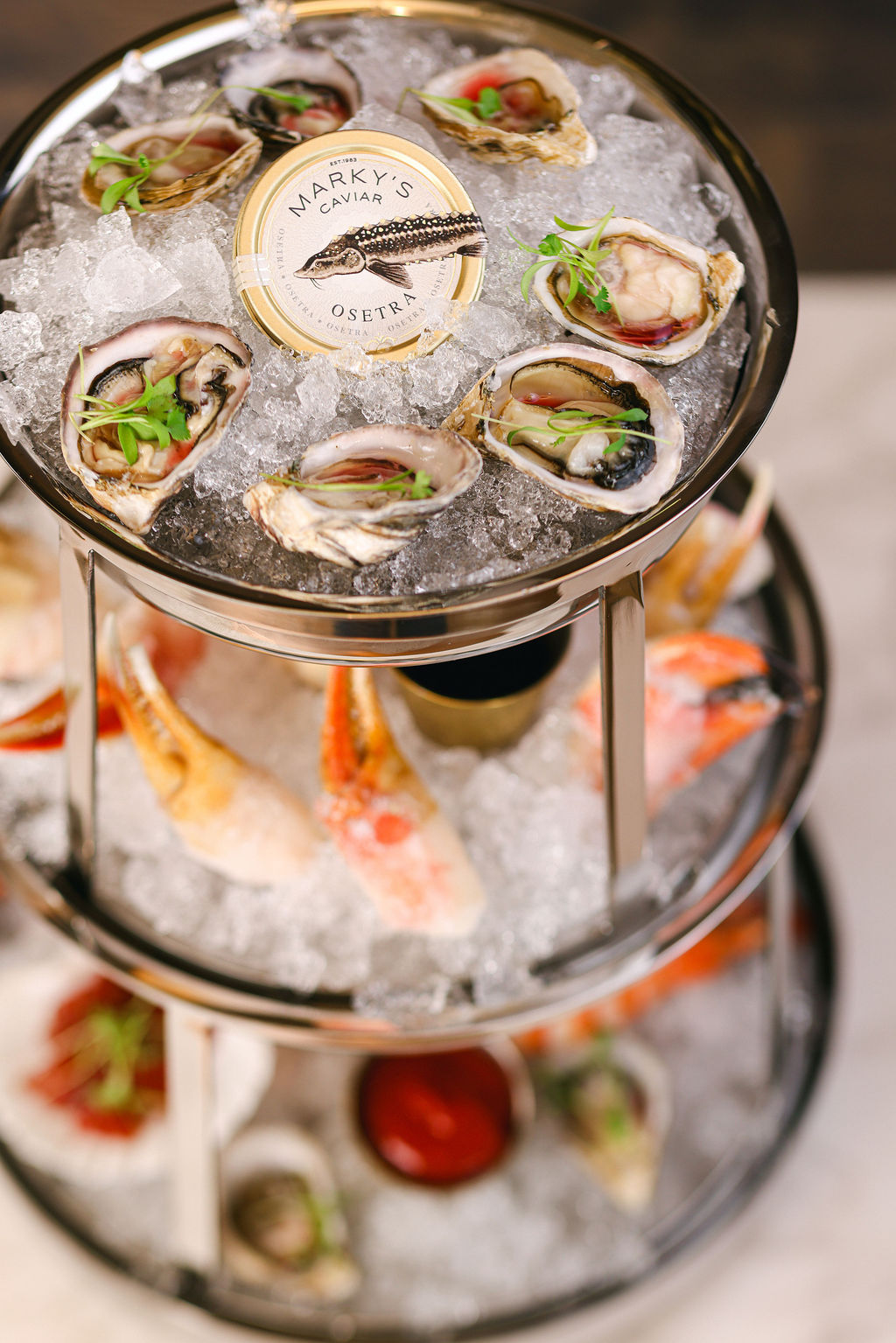 Moody styled whiskey old fashioned cocktail with orange garnish for luxury hotel bar photography by Chelsea Loren