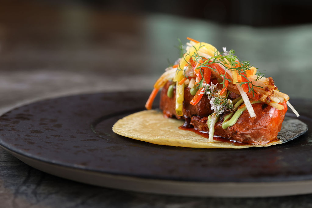 Wagyu burger with caramelized onions styled food photography for Gaylord Pacific Resort restaurant in Chula Vista