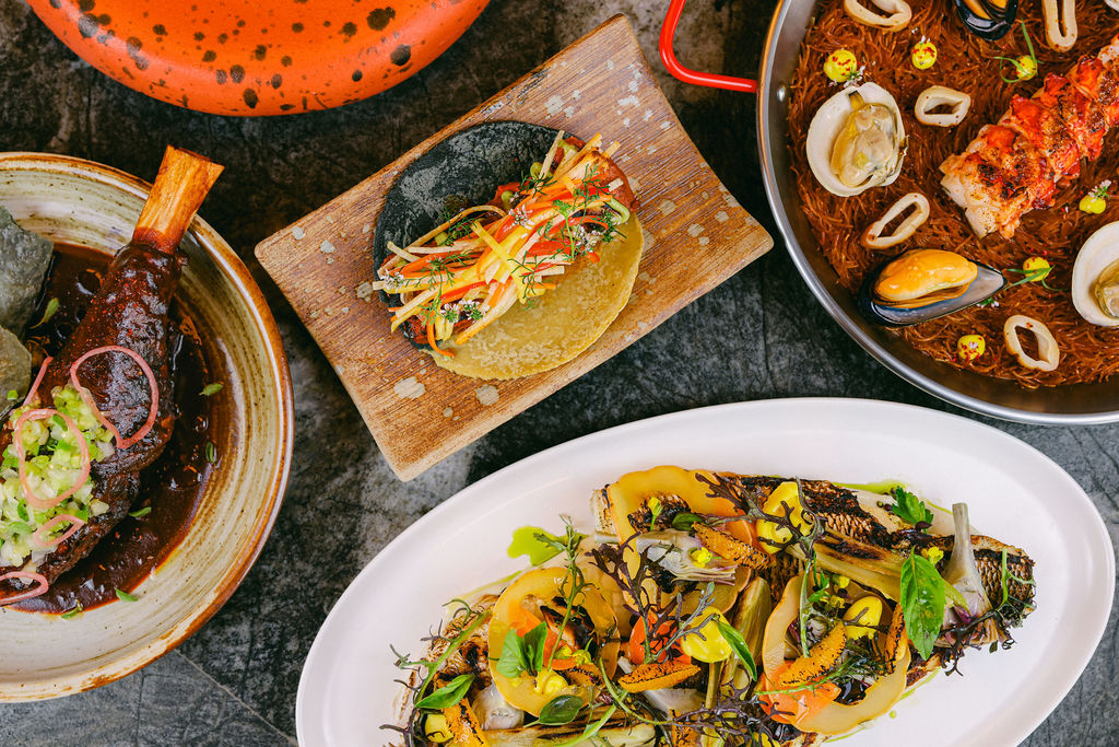 Multi-dish composition spread styled food photography for hotel restaurant marketing at Gaylord Pacific Resort Chula Vista