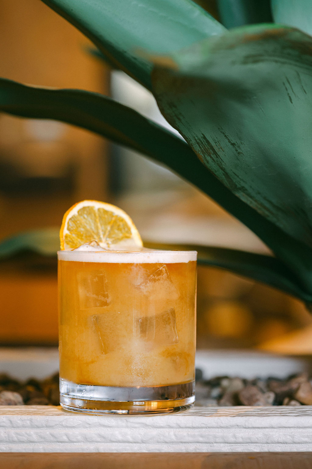 Moody styled amber cocktail for luxury hotel bar menu photography at Gaylord Pacific Resort Chula Vista